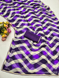 laheriya print georgette fabric with beads design lace border saree with heavy banglori silk blouse.