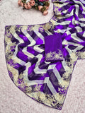 pitta embroidery work "C PALLU " design on laheriya print saree with embroidered blouse.