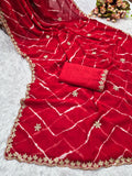 Laheriya print saree with beads embroidery work with embroidered blouse.