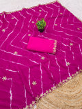 Laheriya print saree with beads embroidery work with embroidered blouse.