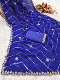 Laheriya print saree with beads embroidery work with embroidered blouse.