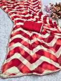 laheriya print georgette fabric with beads design lace border saree with heavy banglori silk blouse.