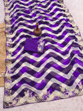 pitta embroidery work "C PALLU " design on laheriya print saree with embroidered blouse.
