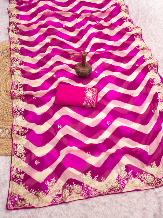 pitta embroidery work "C PALLU " design on laheriya print saree with embroidered blouse.