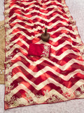 pitta embroidery work "C PALLU " design on laheriya print saree with embroidered blouse.