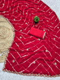 Laheriya print saree with beads embroidery work with embroidered blouse.