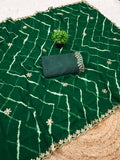 Laheriya print saree with beads embroidery work with embroidered blouse.