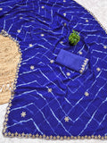 Laheriya print saree with beads embroidery work with embroidered blouse.