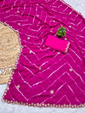 Laheriya print saree with beads embroidery work with embroidered blouse.