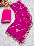 Laheriya print saree with beads embroidery work with embroidered blouse.