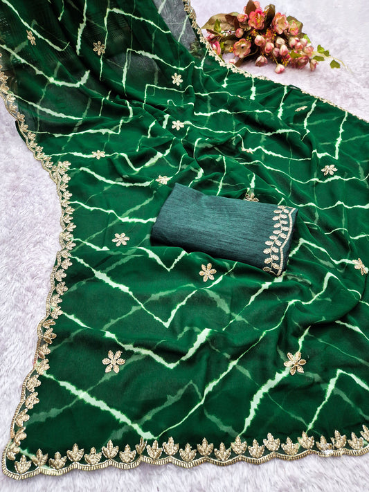 Laheriya print saree with beads embroidery work with embroidered blouse.