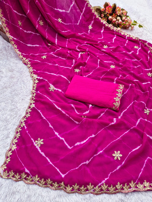 Laheriya print saree with beads embroidery work with embroidered blouse.