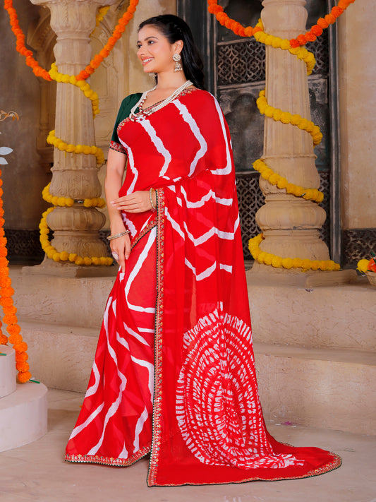 chiffon fabric laheriya print saree with embroidered lace border with heavy banglori silk blouse.